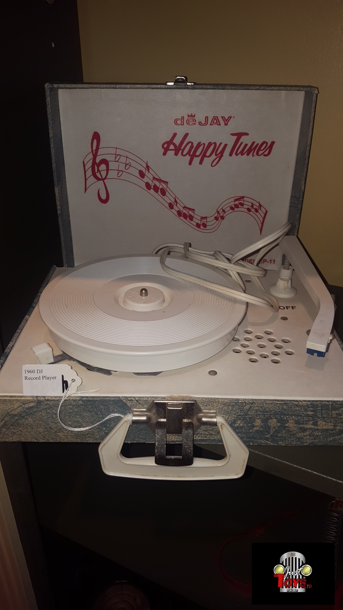 1960 DeJay Happy Tunes Record Player.