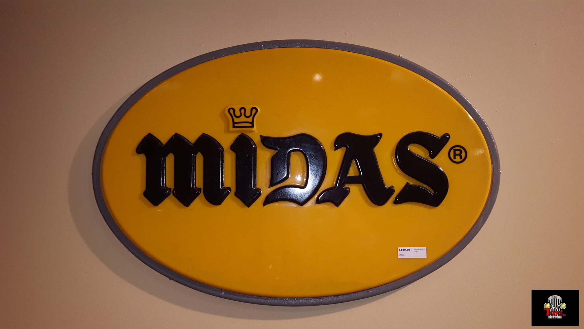 Midas Muffler Sign