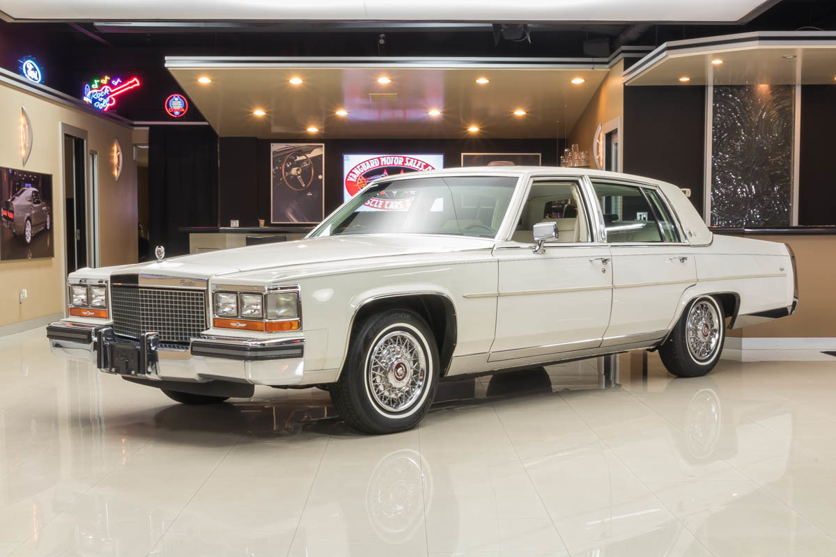 466803 fa63e2a7186387 cadillac fleetwood white 66711